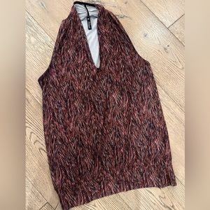 Fall inspired, sleeveless top with banded waist